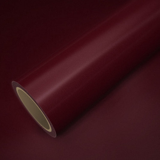 Rouleau de vinyle ICR® bordeaux posé sur une feuille du même vinyle